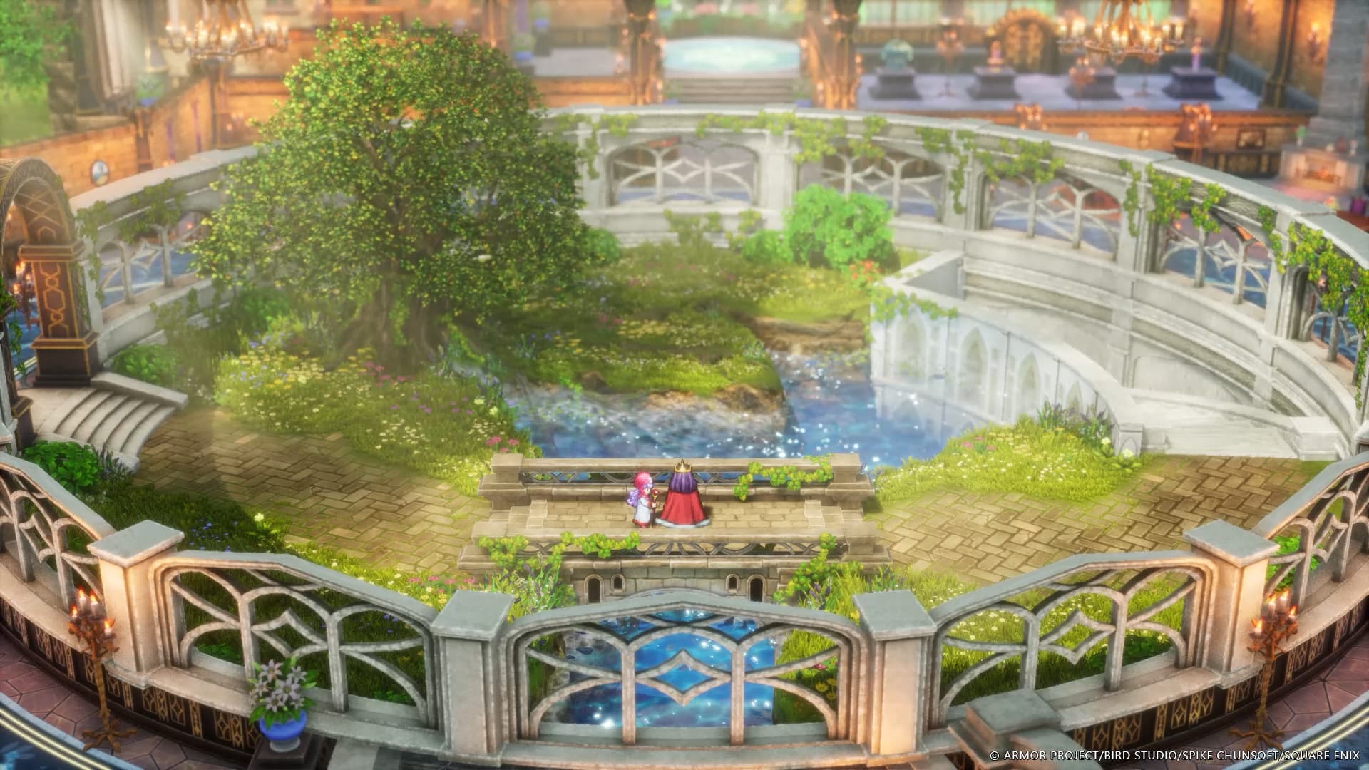 Two people standing in a circular garden