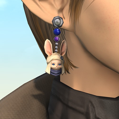 A close-up screenshot of a player character wearing the Loporrit Earring.
